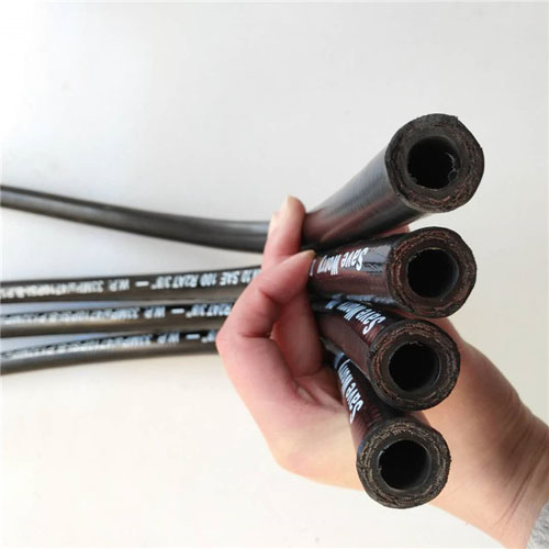 Embossed branding hydraulic hose with smooth surface